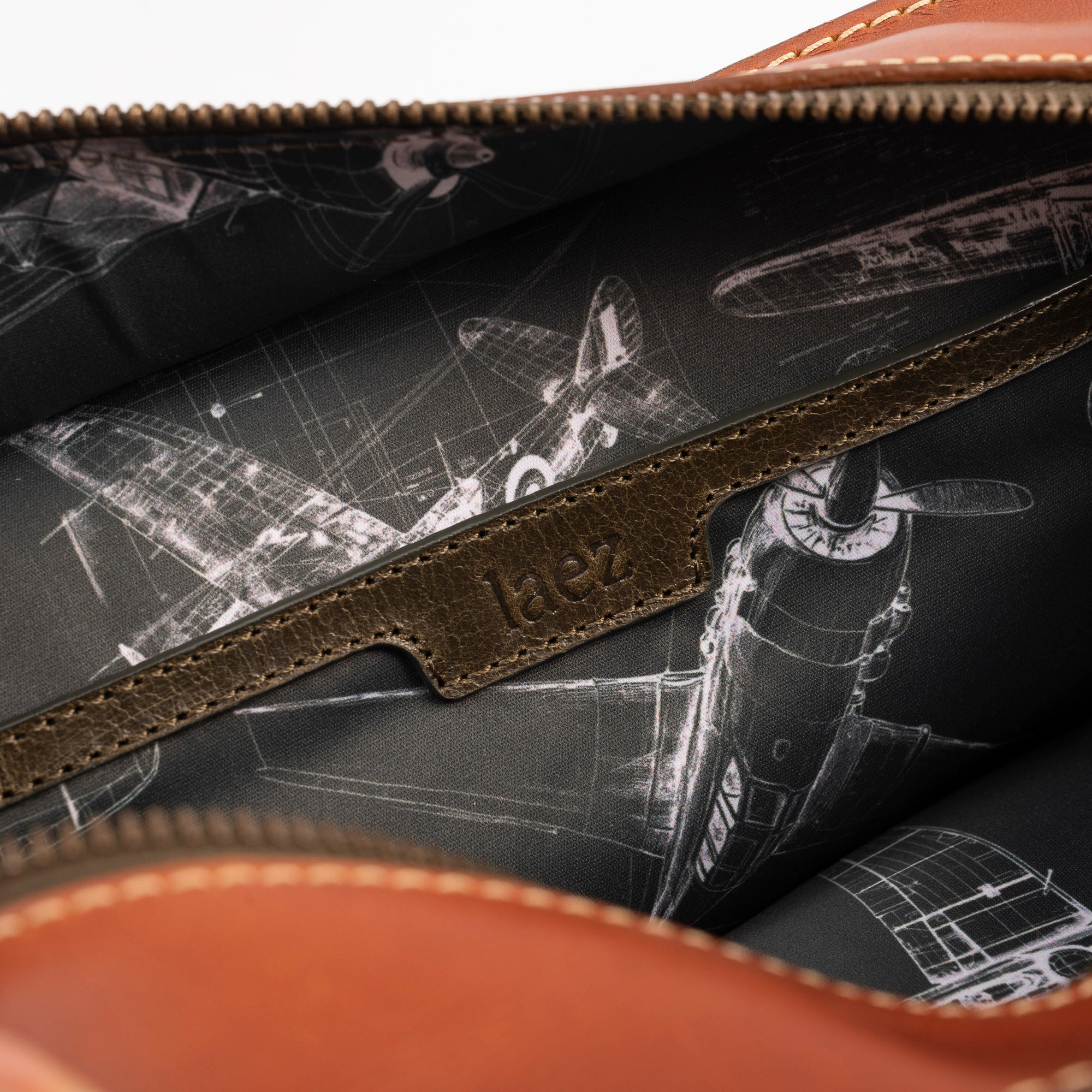 A brown leather travel pouch containing a toothbrush, toothpaste, and various toiletry items for personal care.