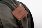 leather luggage tags with metal rings, elegantly designed for travel organization and personalization.