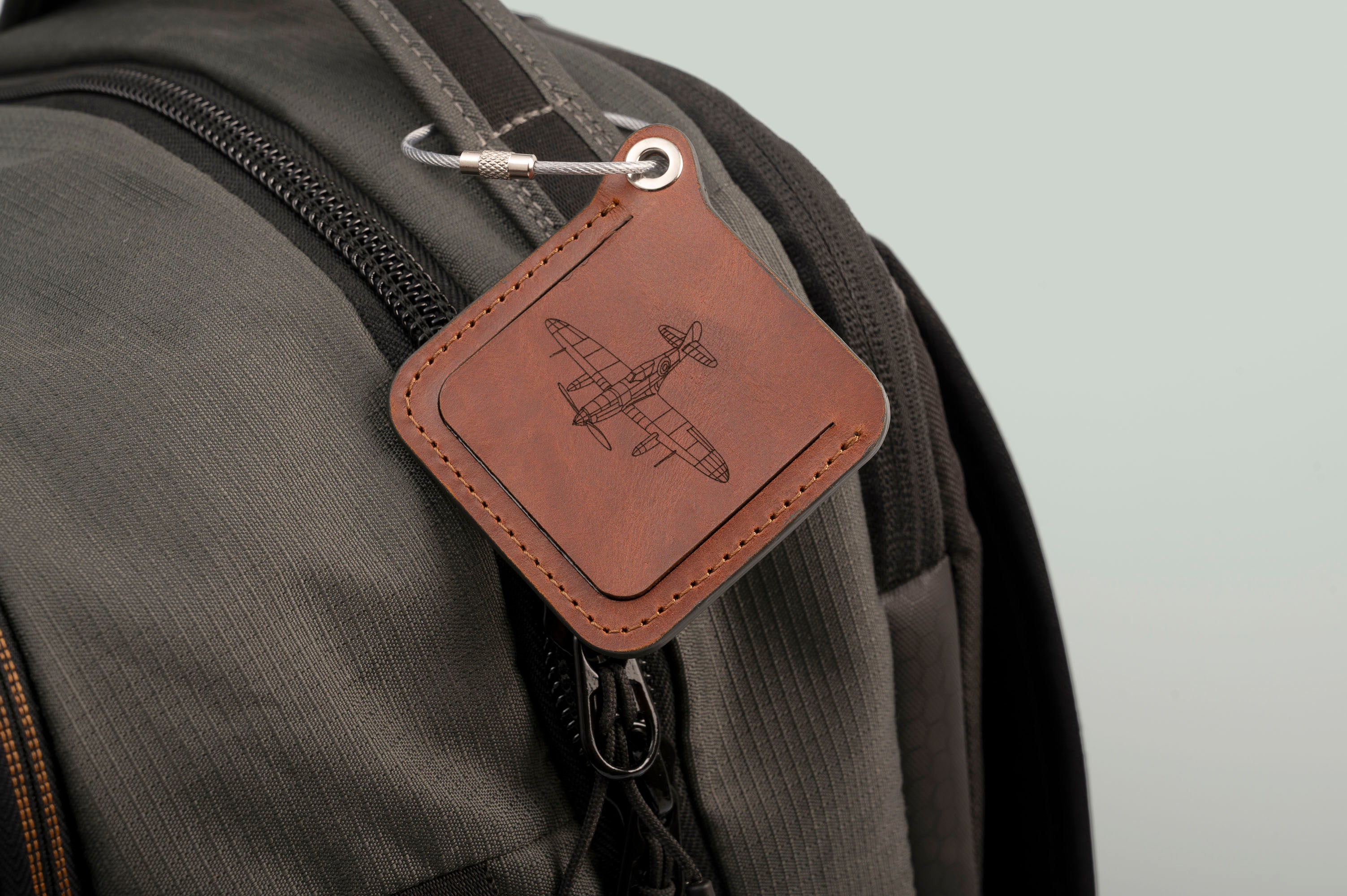 leather luggage tags with metal rings, elegantly designed for travel organization and personalization.